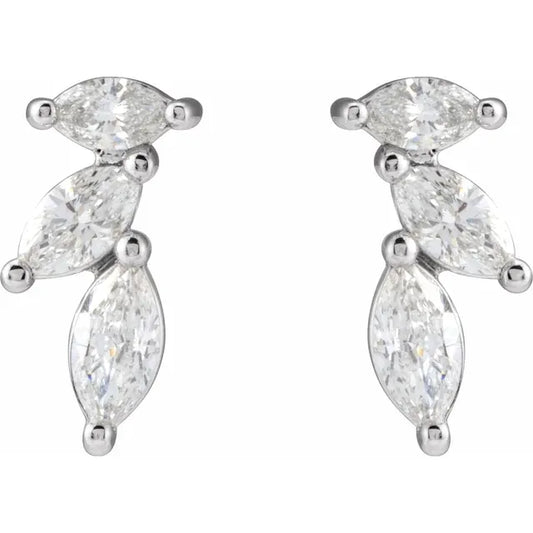 White gold marquise diamond stud earrings on a white background.