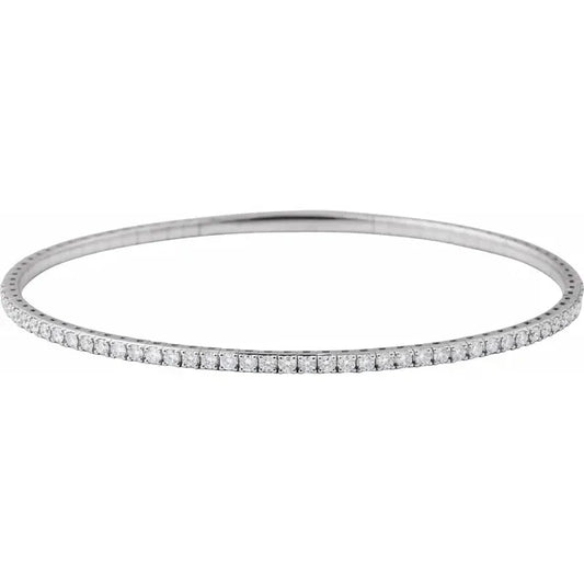 White gold diamond bangle bracelet on a white background