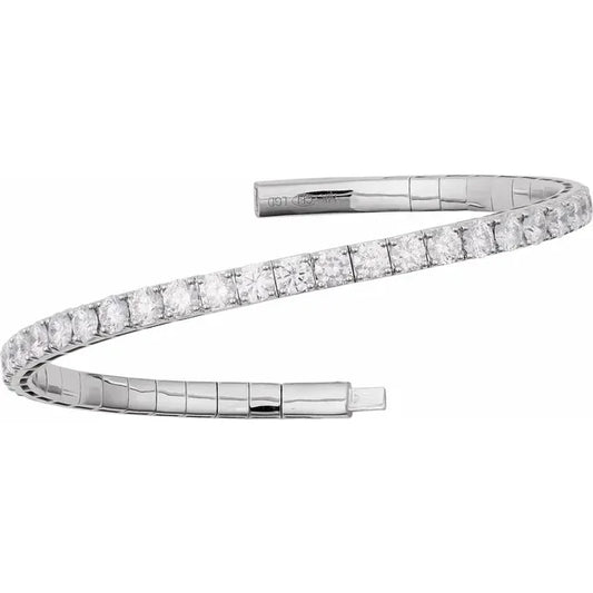 White gold diamond cuff bracelet on a white background.