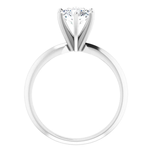 Solitaire diamond engagement ring on a white baqckground.