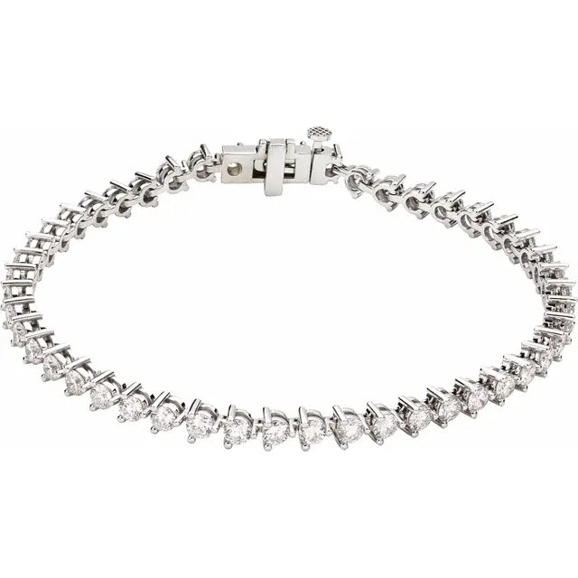 Silver tennis bracelet on a white background