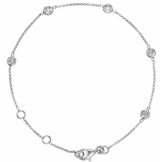 Silver diamond station bracelet on a white background