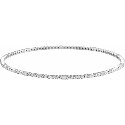 White gold diamond bead bracelet on a white background.
