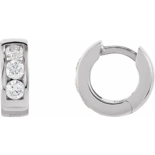 White gold diamond hoop earrings on a white background