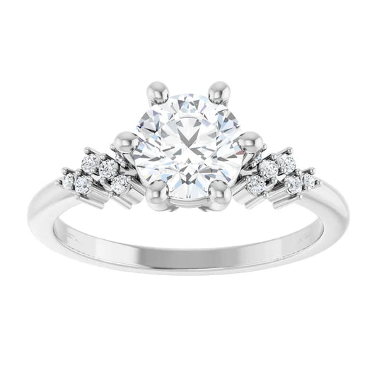 White gold diamond engagement ring with a unique diamond halo setting on a white background.