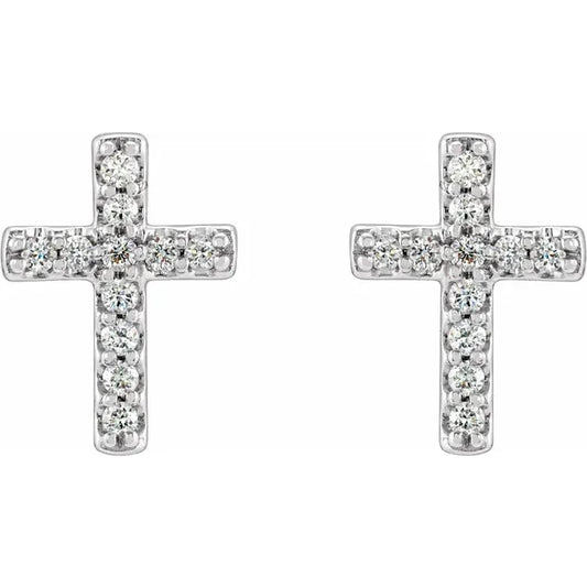 White gold diamond cross stud earrings on a white background.