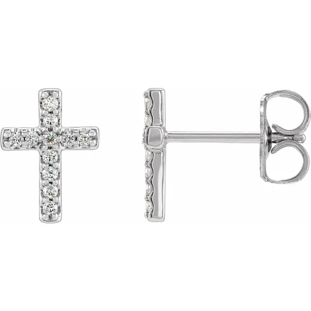 White gold diamond cross stud earrings on a white background.