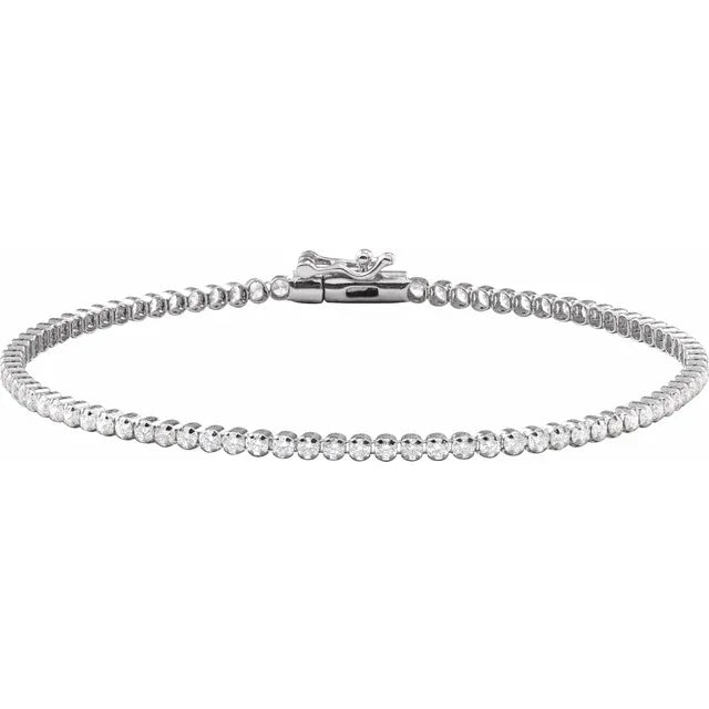 Silver diamond tennis bracelet with a clasp on a white background