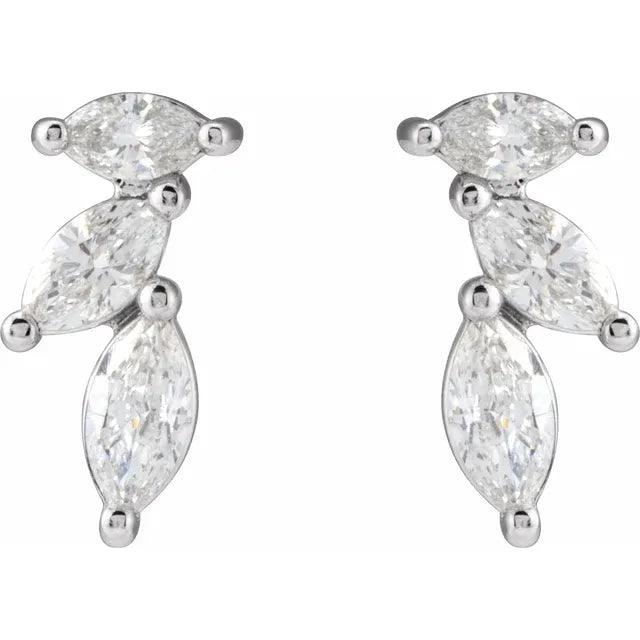 White gold marquise diamond stud earrings on a white background.