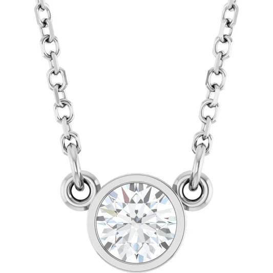 White gold bezel-set diamond pendant necklace on a white background.