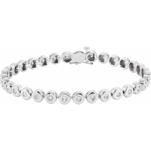 White gold diamond station bracelet on a white background.