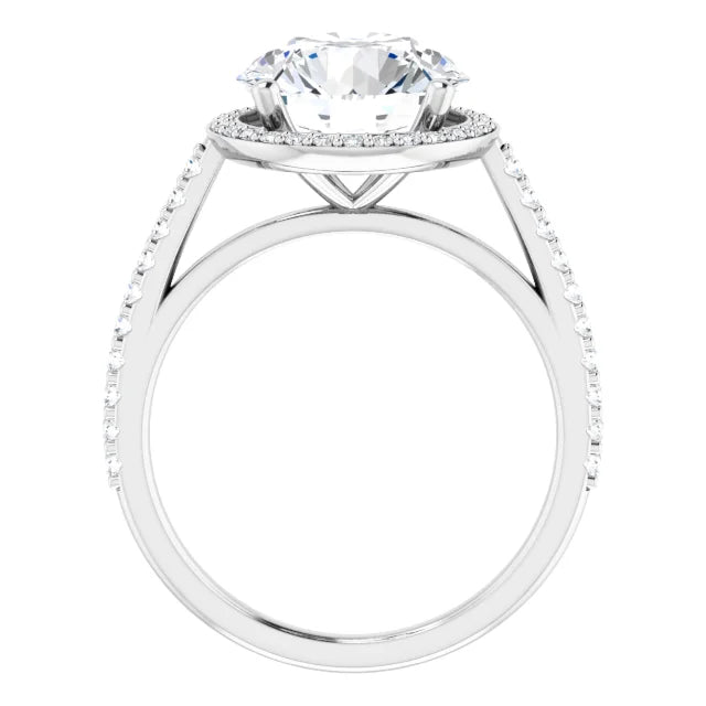 Silver diamond engagement ring with a halo setting and diamond-studded band