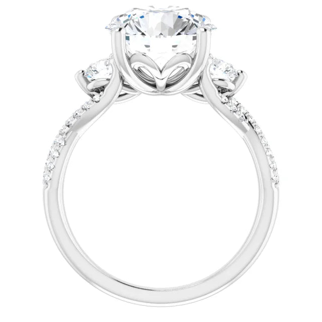 Three-stone diamond engagement ring with a twisted band on a white background 