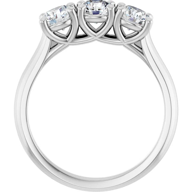 Three-stone diamond engagement ring with a shared prong setting