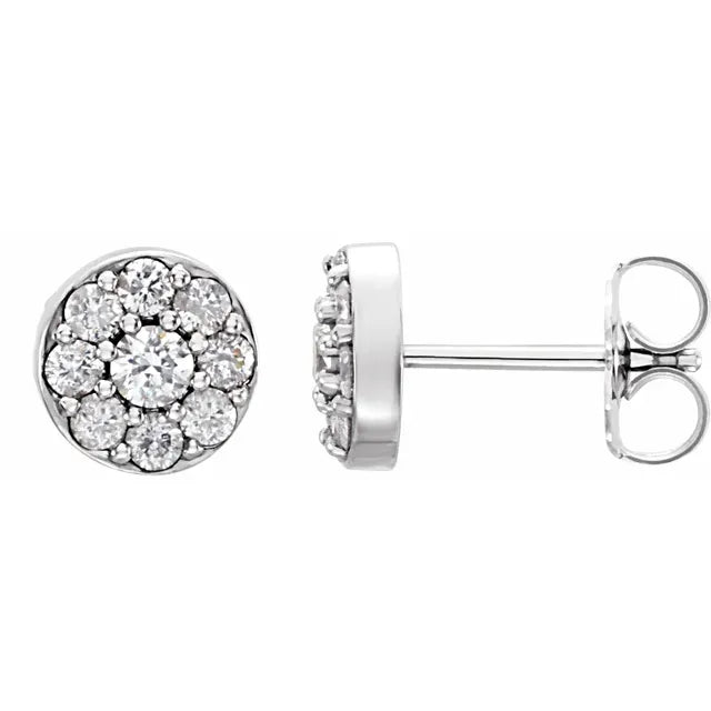 Pair of diamond cluster stud earrings on a white background