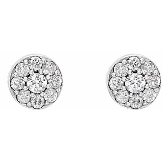 Pair of diamond cluster stud earrings on a white background