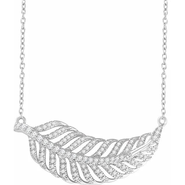 White gold necklace with a diamond-encrusted feather pendant. The background is white.