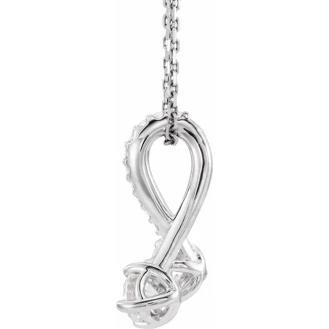 White gold necklace with two stone pendant on a white background