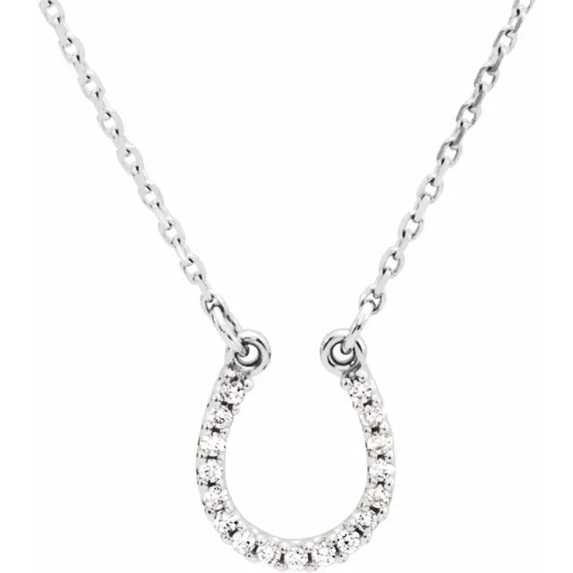 White gold diamond horseshoe necklace on a white background