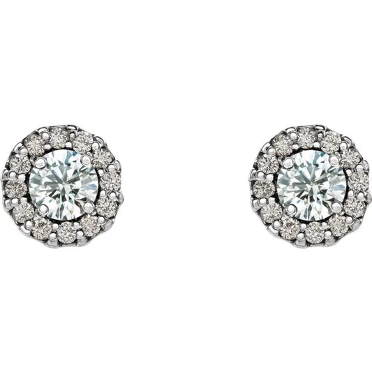 Pair of diamond halo stud earrings on a white background