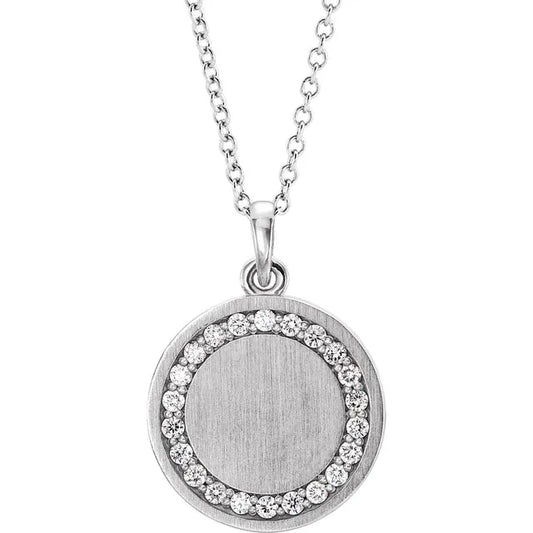 White gold diamond disc necklace on a white background.