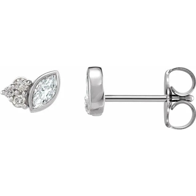 White gold marquise diamond stud earrings on a white background.