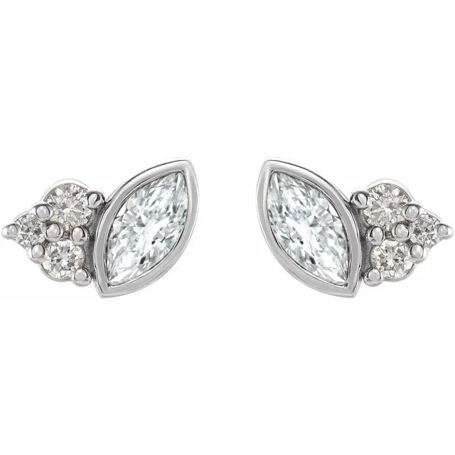 White gold marquise diamond stud earrings on a white background.