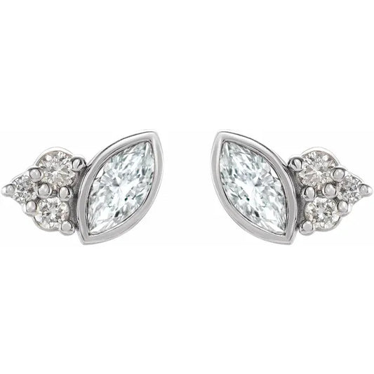 White gold marquise diamond stud earrings on a white background.