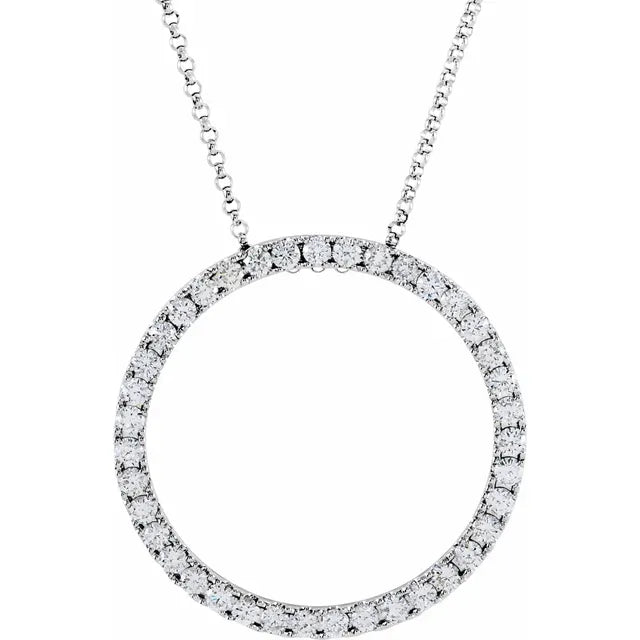 White gold necklace with a circular pendant fully encrusted with diamonds. The background is white.