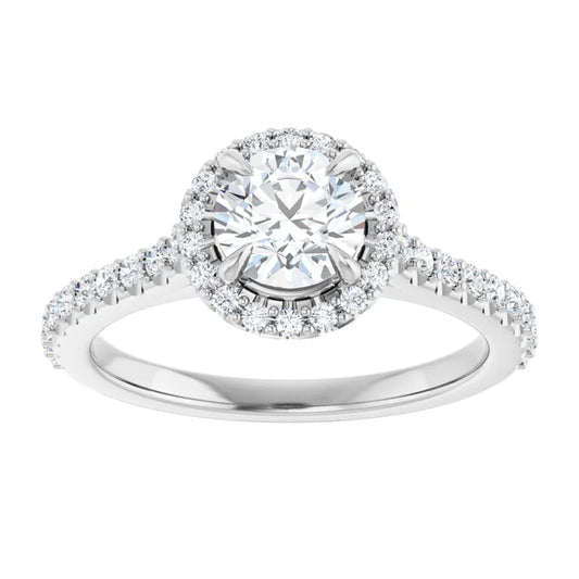 White gold diamond engagement ring with a halo setting and diamond band on a white background.