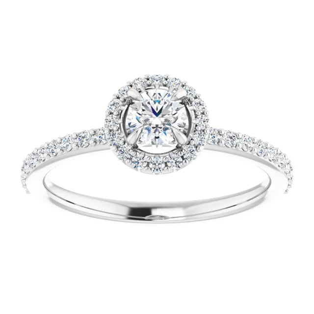 White gold diamond engagement ring with a double halo setting and diamond band on a white background.