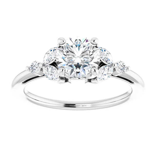 White gold diamond engagement ring with a cluster setting on a white background.