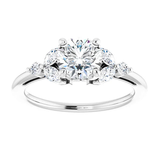 White gold diamond engagement ring with a cluster setting on a white background.