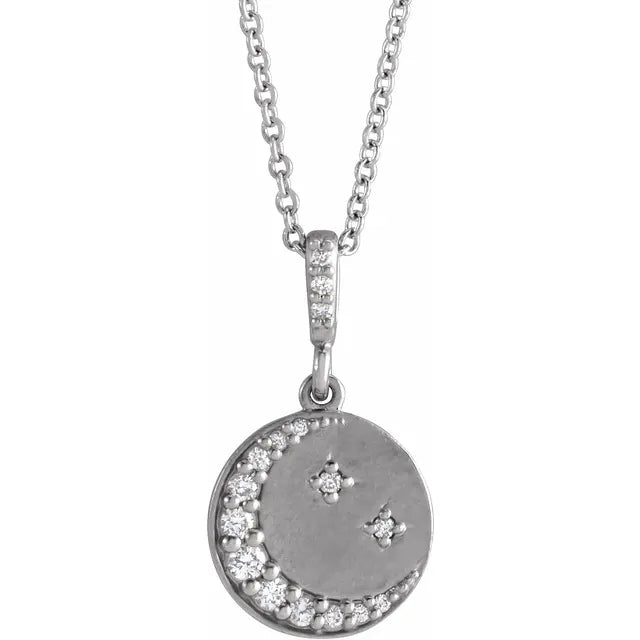 White gold necklace with a diamond moon and star pendant on a white background.