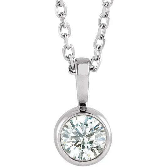 White gold bezel-set diamond pendant on a white background.