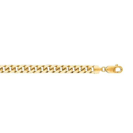 Yellow gold Cuban link bracelet on a white background.