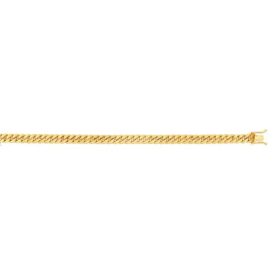 Yellow gold cuban link chain on a white background.