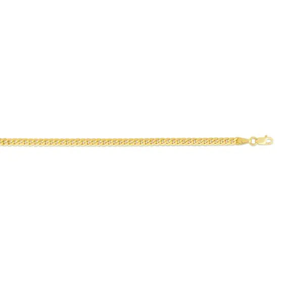 Yellow gold cuban link chain on a white background.