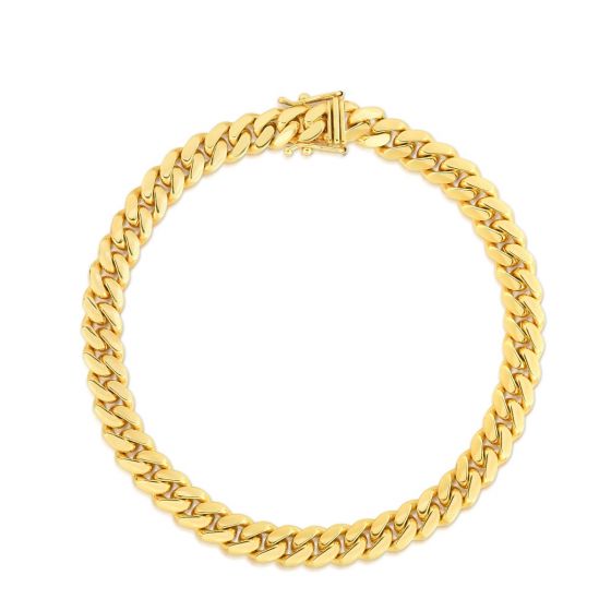 Yellow gold Cuban link bracelet on a white background.