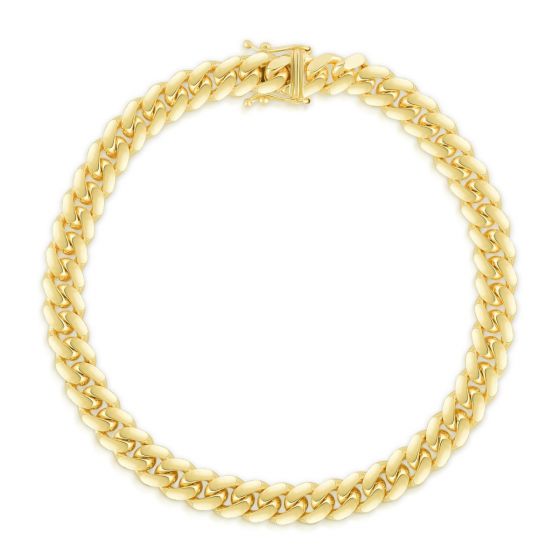 Yellow gold Cuban link bracelet on a white background.