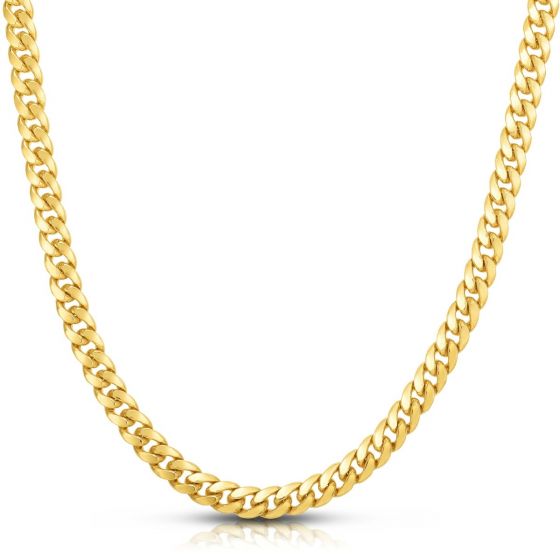 Yellow gold cuban link chain on a white background.