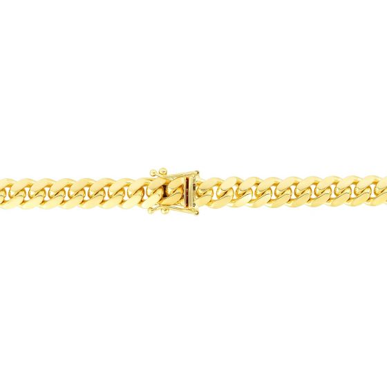 Yellow gold Cuban link bracelet on a white background.