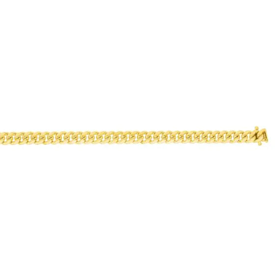 Yellow gold Cuban link bracelet on a white background.