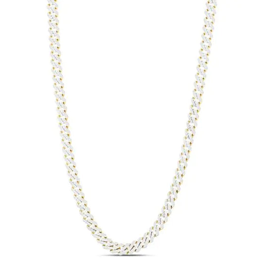 Yellow gold Cuban link chain with diamond accents on a white background.